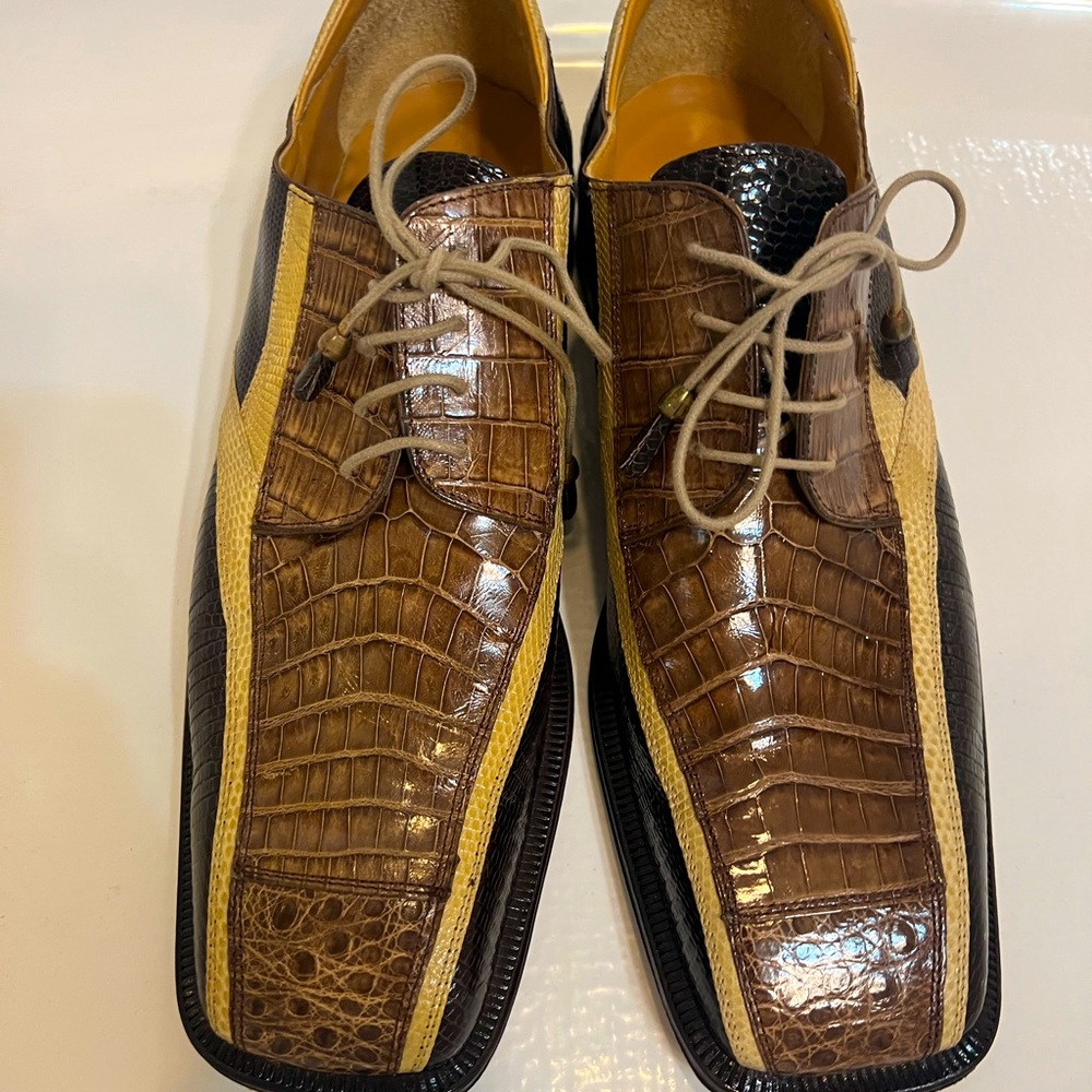 Multi color crocodile shoes.